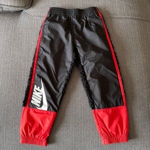 Nike 7 year old boy’s sweat pants. Absolutely the coolest. Never worn